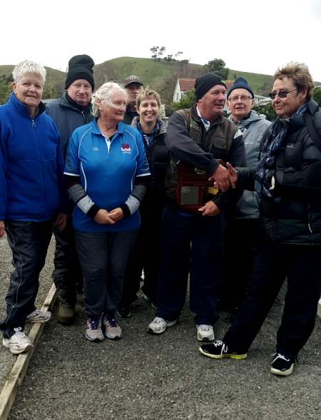 Wanganui East players receiving the Central Districts shield